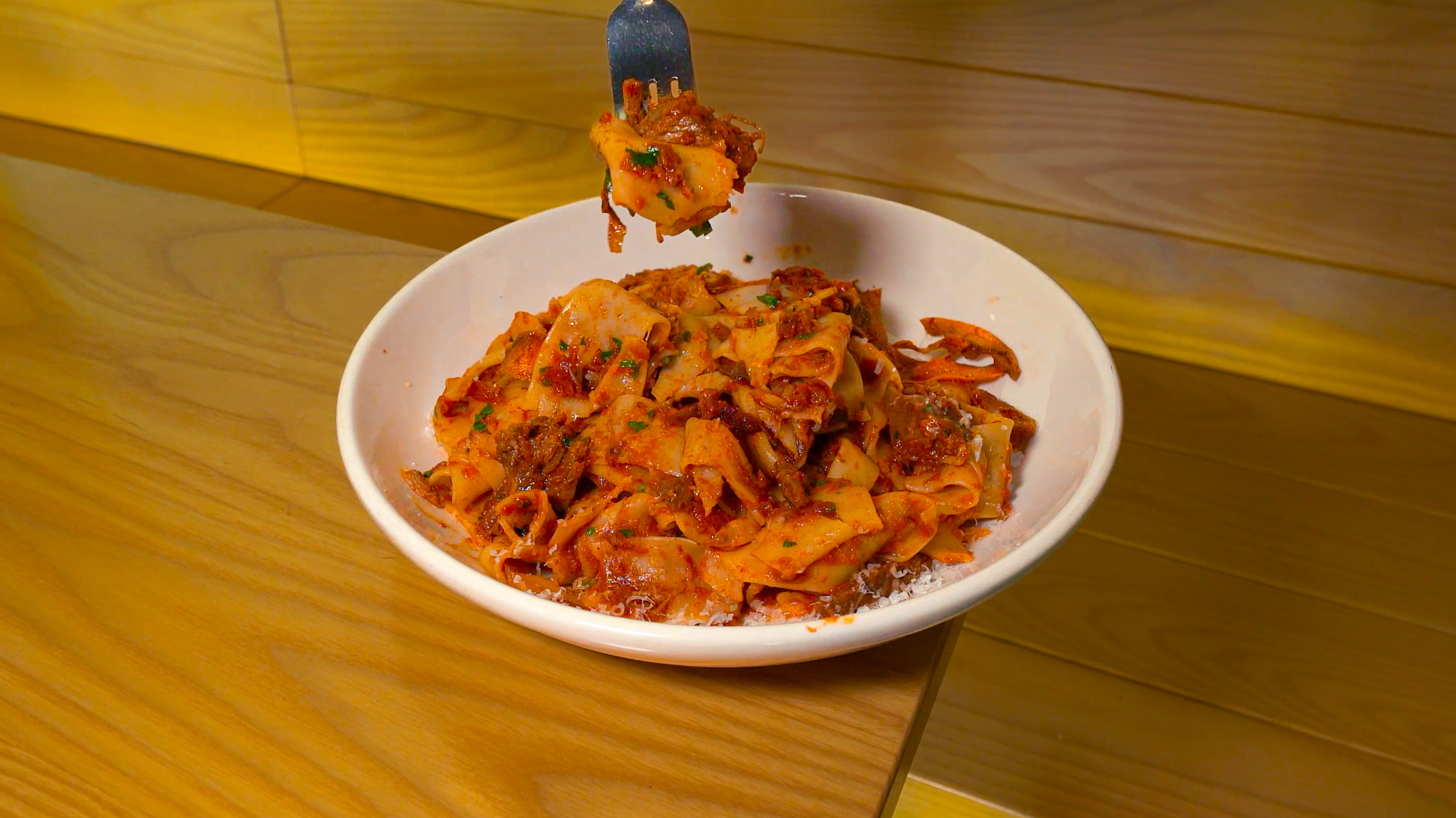 Pasta being finished in the Bar Torino kitchen